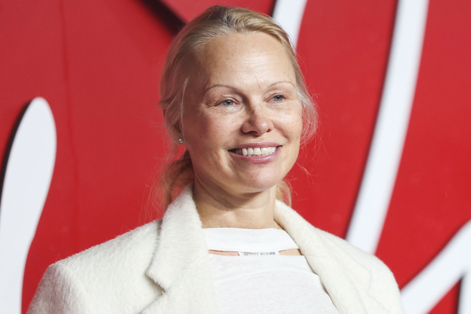 Pamela Anderson Radiates Natural Beauty, Goes Makeup-Free at Yet Another Fashion Extravaganza 1 Pamela-Anderson-fashion-awards-120423-tout-1-7aa412a7cbc347dfb3376d6bf83910f2