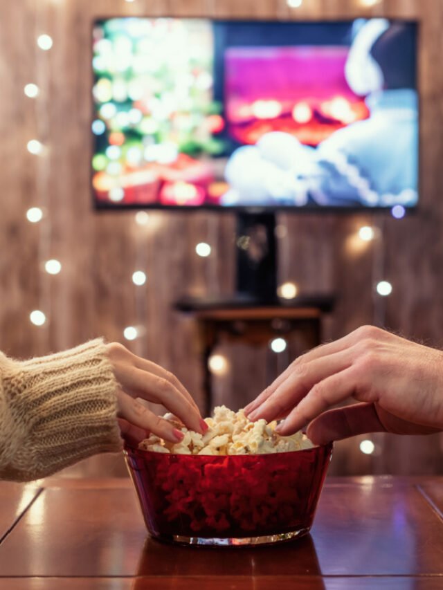 A-couple-watching-a-movie-on-Christmas.-Photography-by-FTiare.-Image-via-Shutterstock